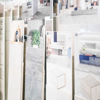 A collage of pictures of different types of tiles in a store.