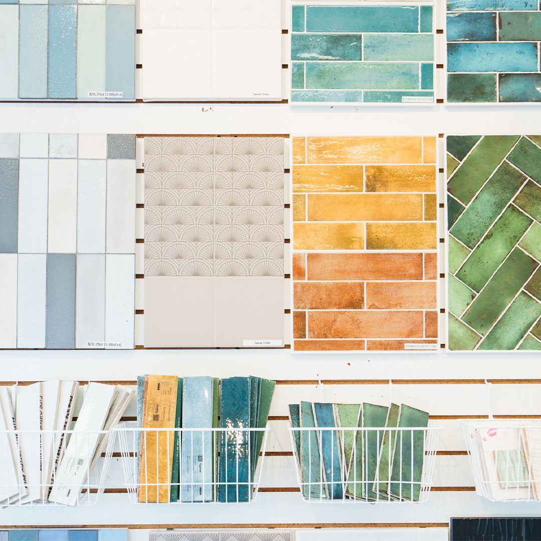 A display of different colored tiles on a wall