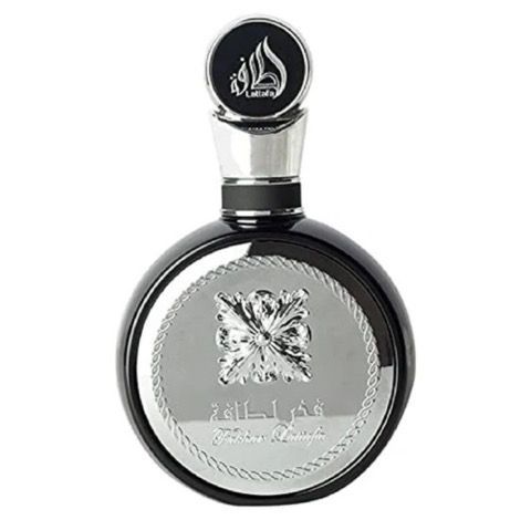 Black and silver perfume bottle with a flower design and silver accents. The label is in Arabic.