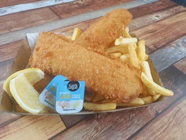 Fish and Chips With Lemon and Dipping Sauce — Pt Cartwright Seafoods in Warana, QLD