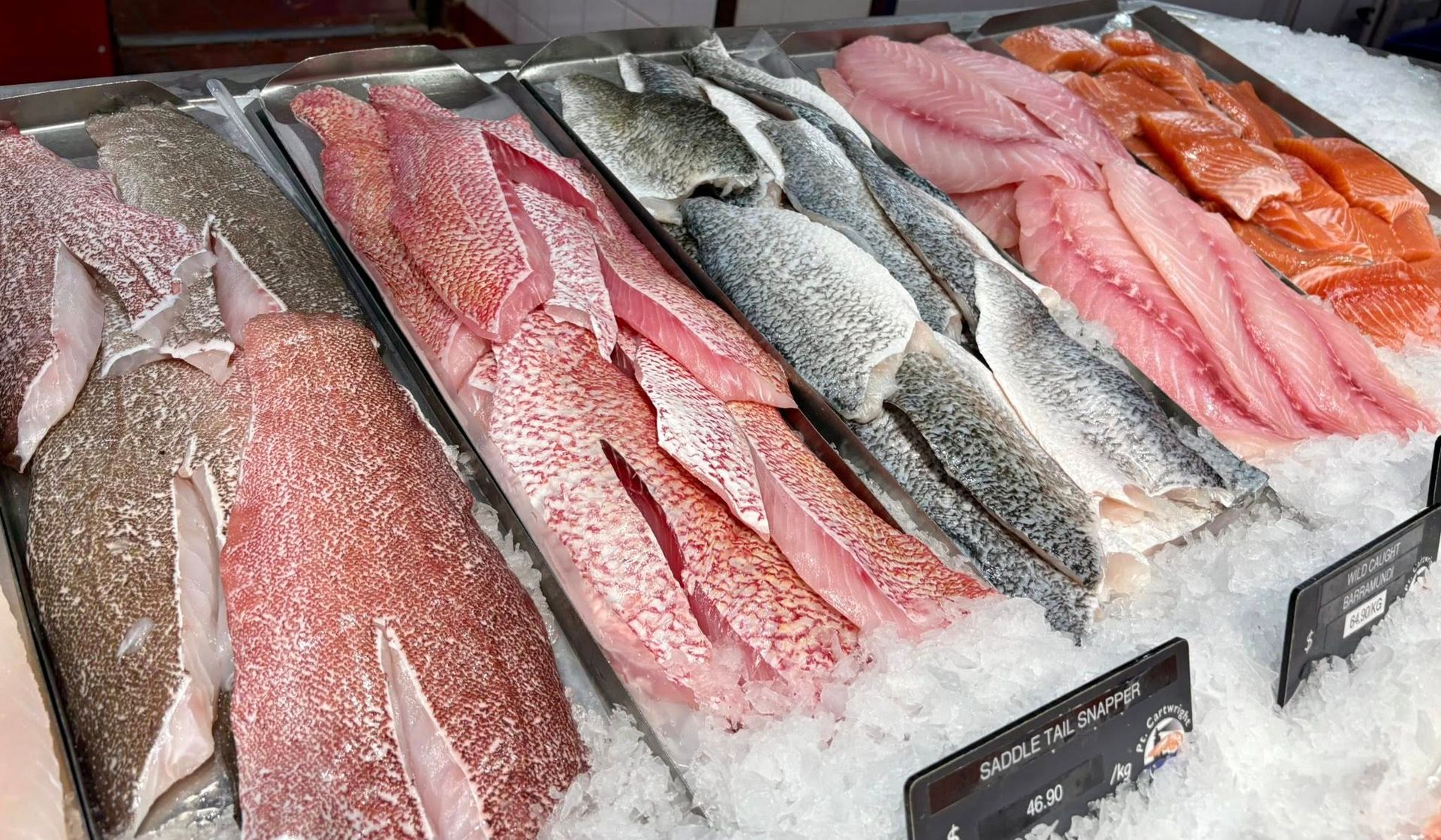 Fresh Fish Fillets Displayed on Ice at a Market — Pt Cartwright Seafoods in Warana, QLD