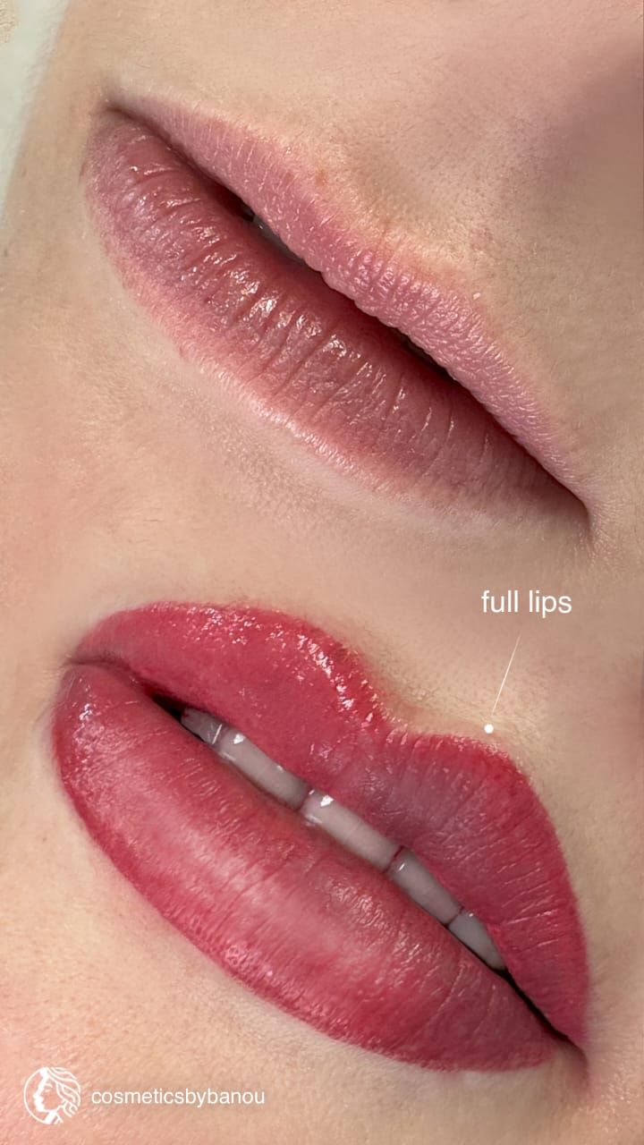 Close-up of two lips: nude matte top lip and glossy red lipstick on the bottom lip.