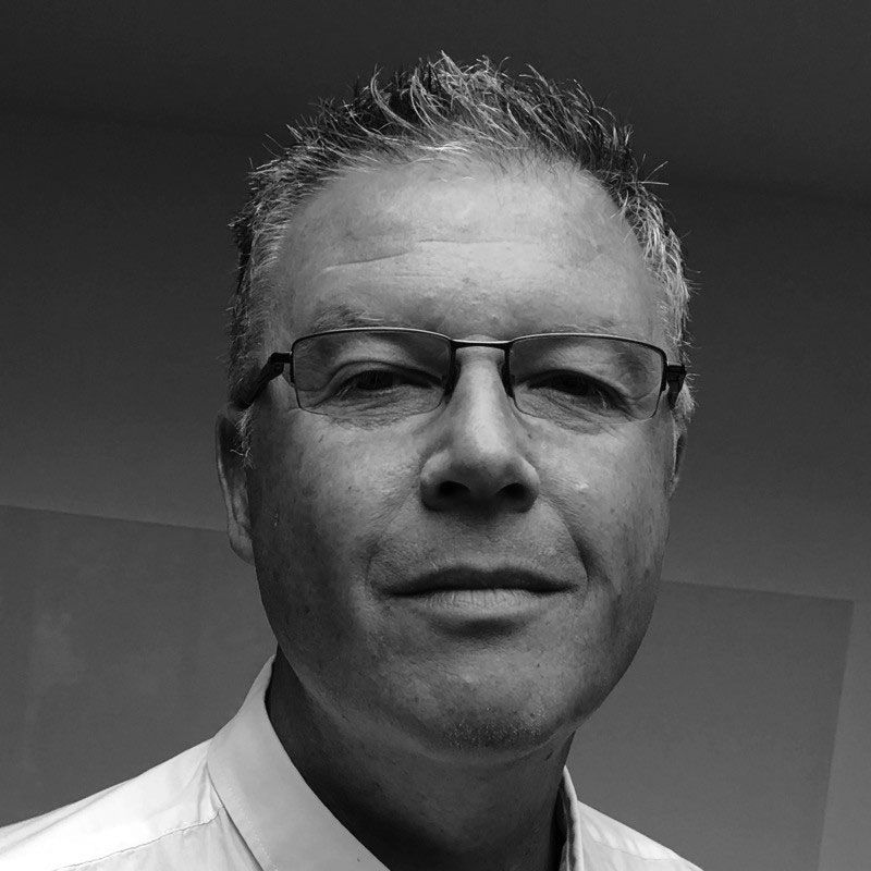 A black and white photo of Colin Blatchford-Brown