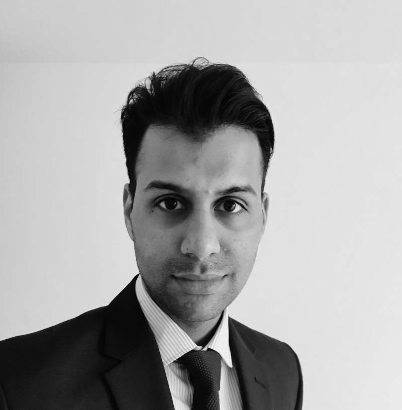 A black and white photo of Aman Sharma