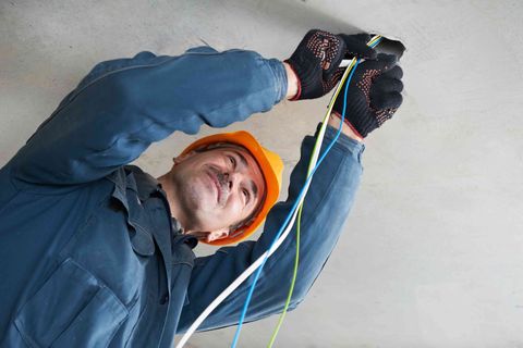 Electrician doing installation