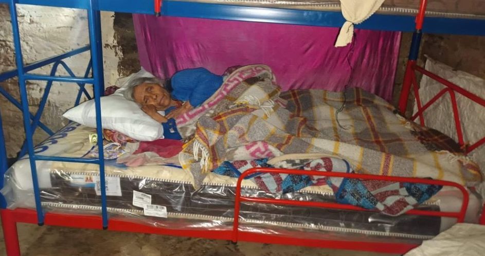 From wooden pallets on a dirt floor to a new bed