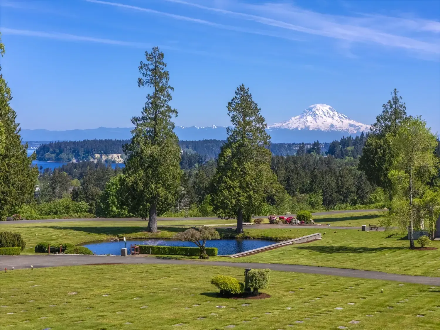Aerial view of peaceful memorial park grounds and landscaped pathways