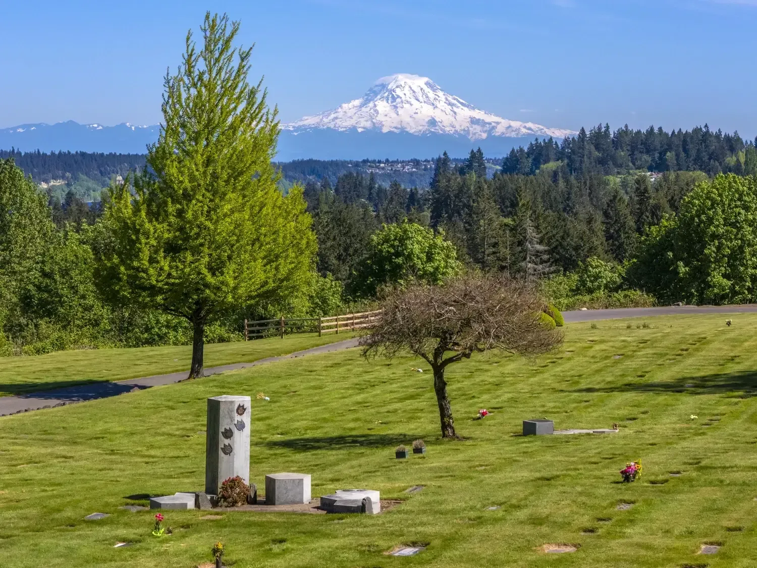 Memorial grounds with organized pathways and open green areas