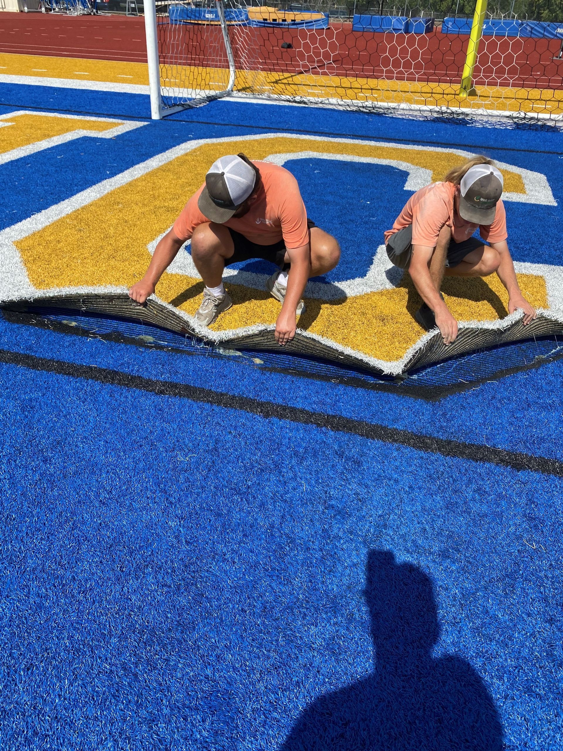Artificial turf repairs. Hot melt glue, cold glue, inlay repairs, seam repairs, sink hole repairs, base repairs. Football fields, soccer fields, baseball fields, softball fields, indoor turf — Tulsa, OK — Sports Surface Management