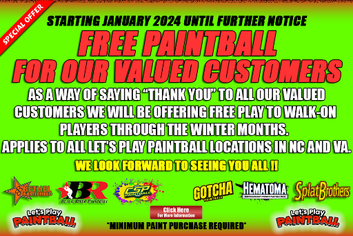 A green sign that says free paintball for our valued customers