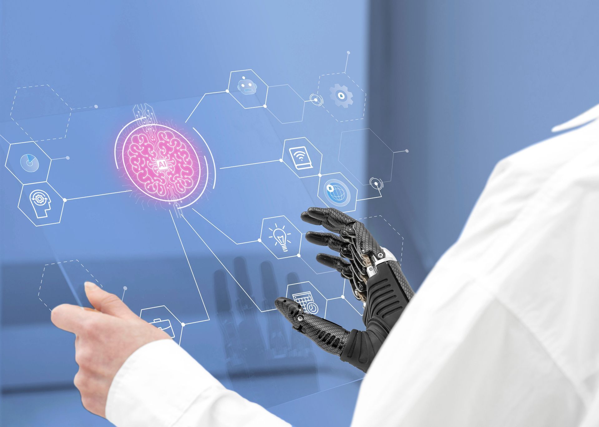 A person with a robotic arm is using a virtual screen.