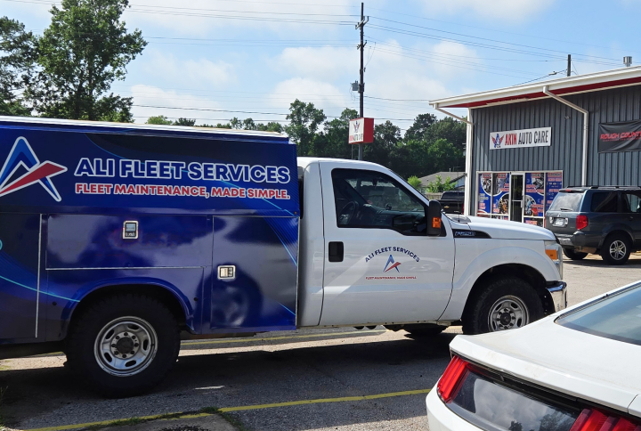 Blue and white truck | Akin Auto Care