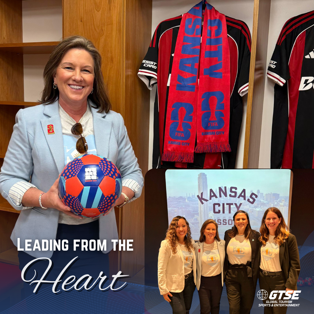 Woman with soccer ball, team jersey, scarf; Kansas City, Missouri sign; women with