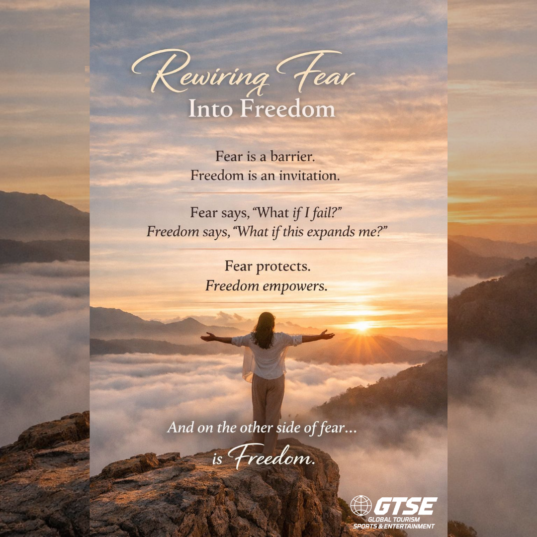Sunrise over mountains with a person raising arms; text reads Rewiring Fear Into Freedom. Sunrise over mountains with a person raising arms; text reads Rewiring Fear Into Freedom.