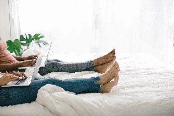 Couple using laptop — Tampa, FL — North Tampa Foot Care Couple using laptop — Tampa, FL — North Tampa Foot Care