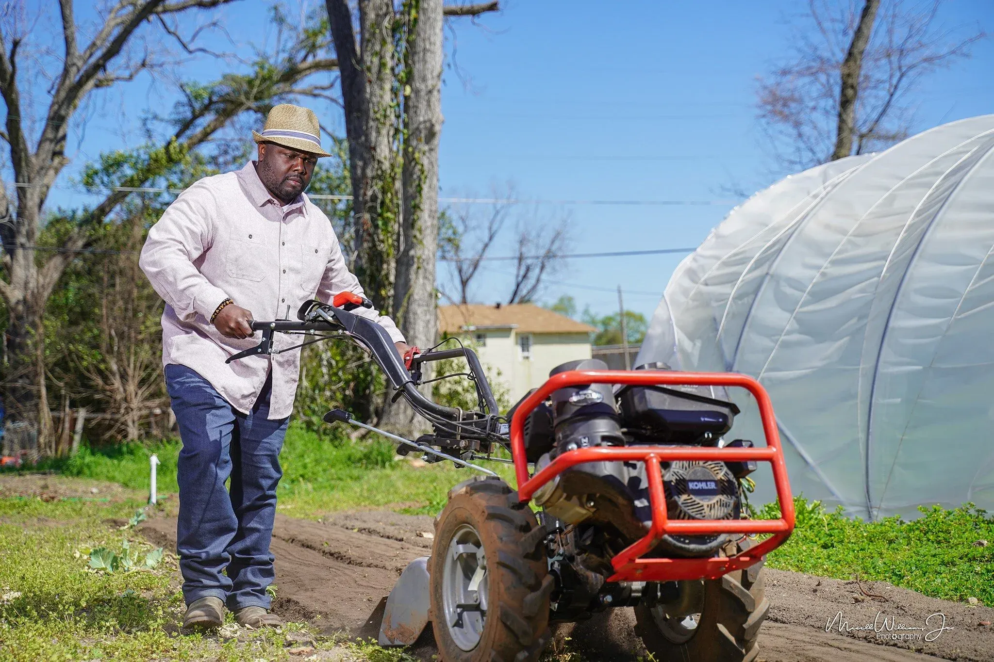 Preparing the ground for planting at a Flint River Fresh community garden