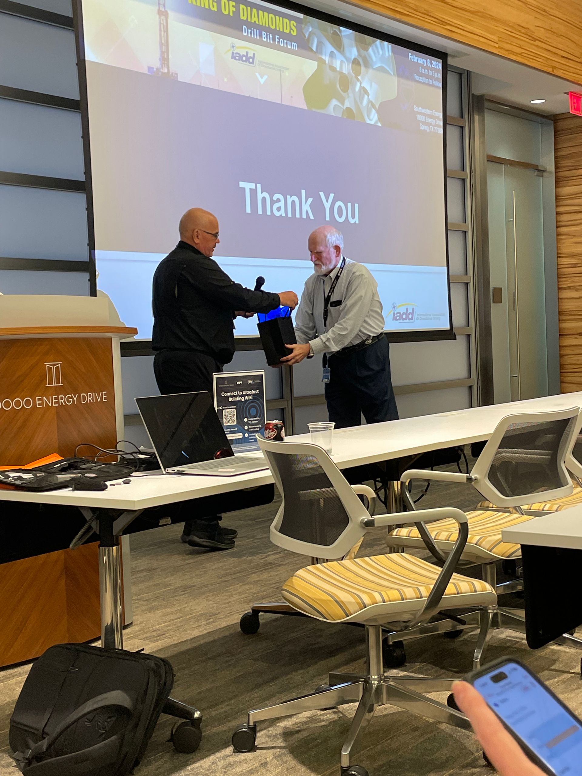 Jim OBerkircher presenting gift to committee