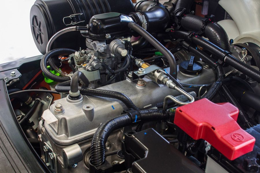 A Close-up Of the Engine of A Forklift with The Hood Open — GT Auto Center in Tweed Heads South, NSW