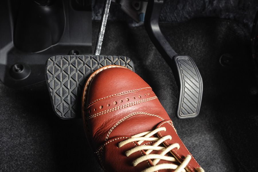A Person Is Pressing the Brake Pedal of A Car — GT Auto Center in Tweed Heads South, NSW