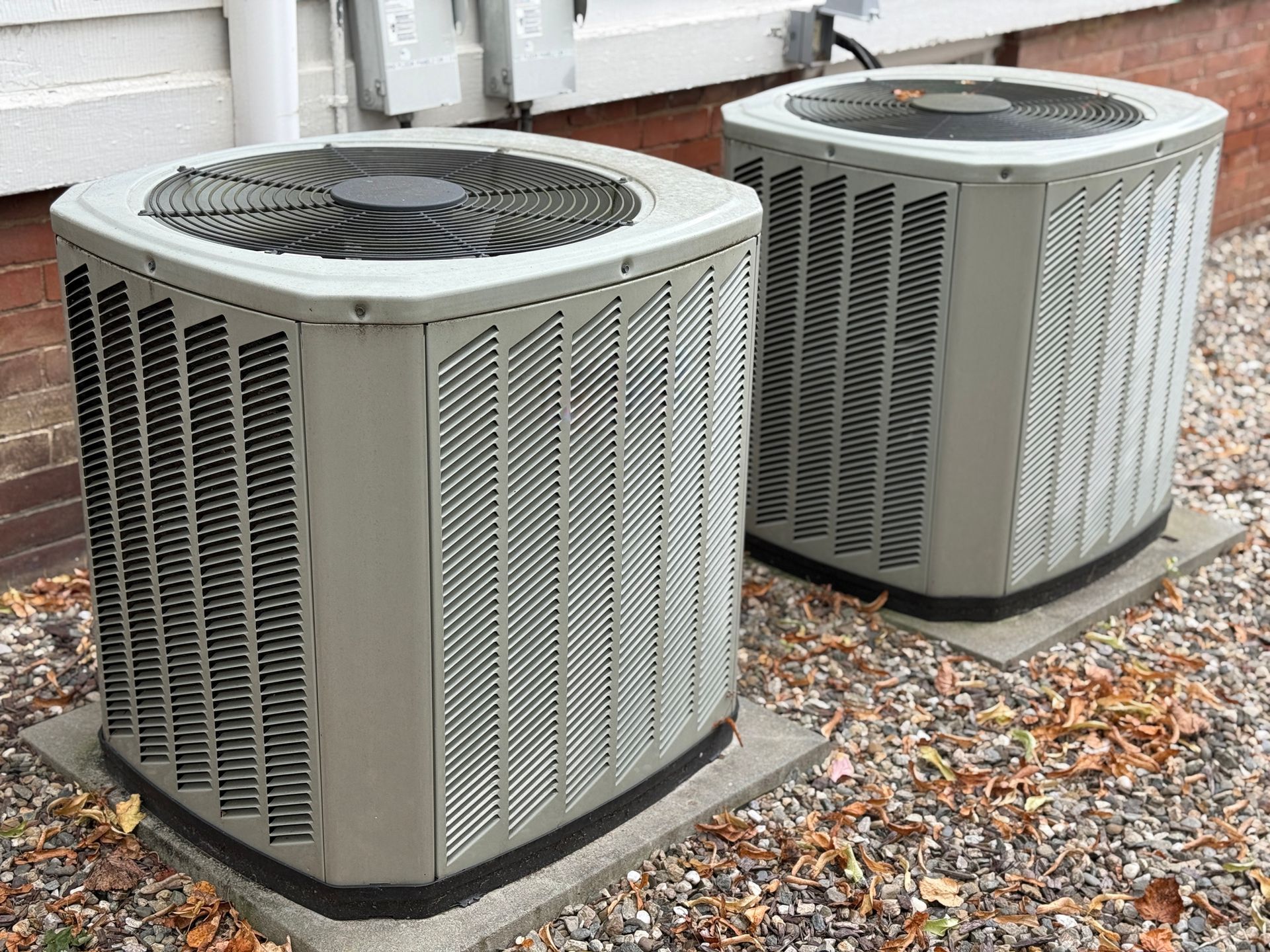 Central air conditioning unit outside a Wylie, TX, home during late summer.