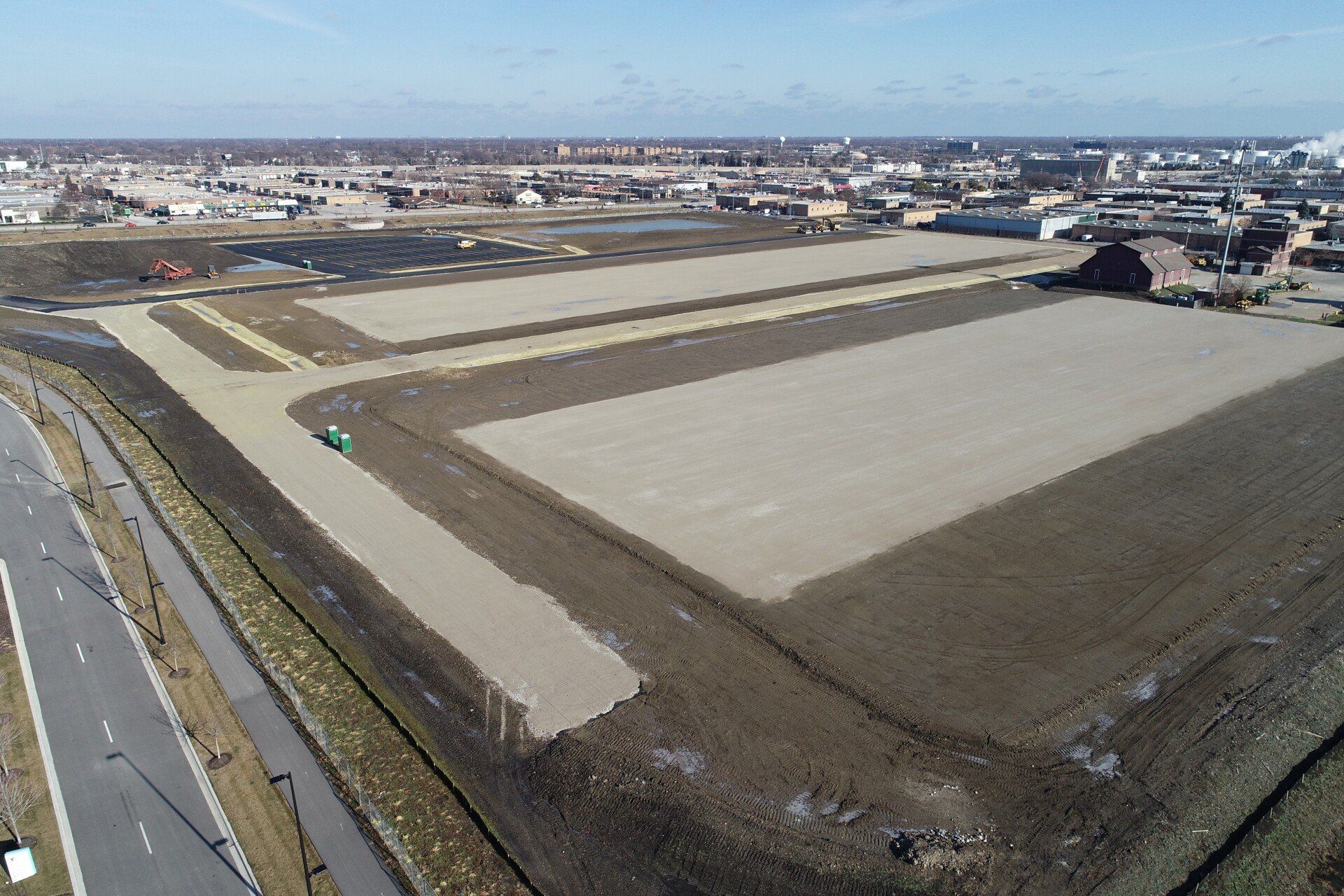 An aerial view of a residential area with lots of empty lots