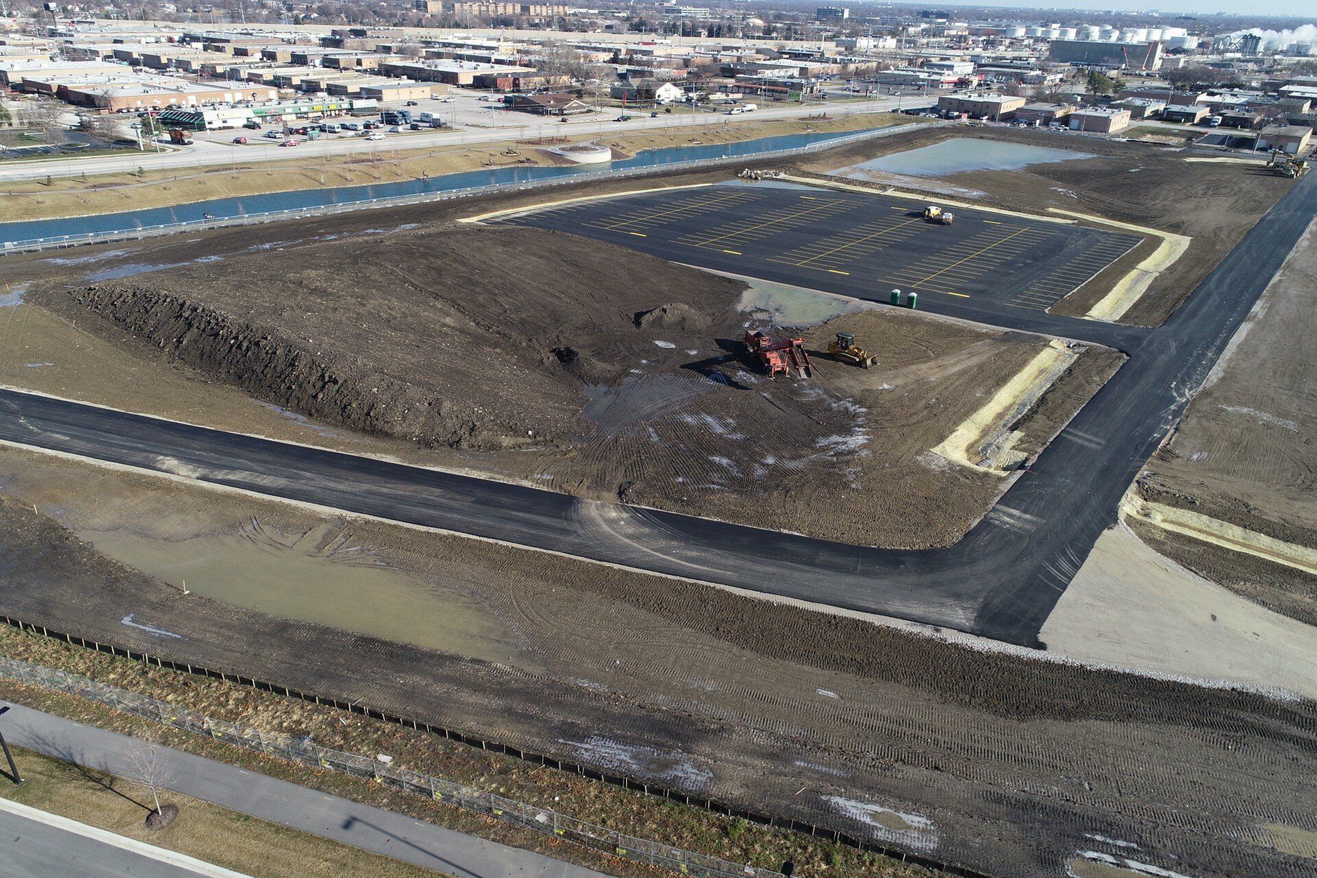 An aerial view of a construction site with a lot of dirt