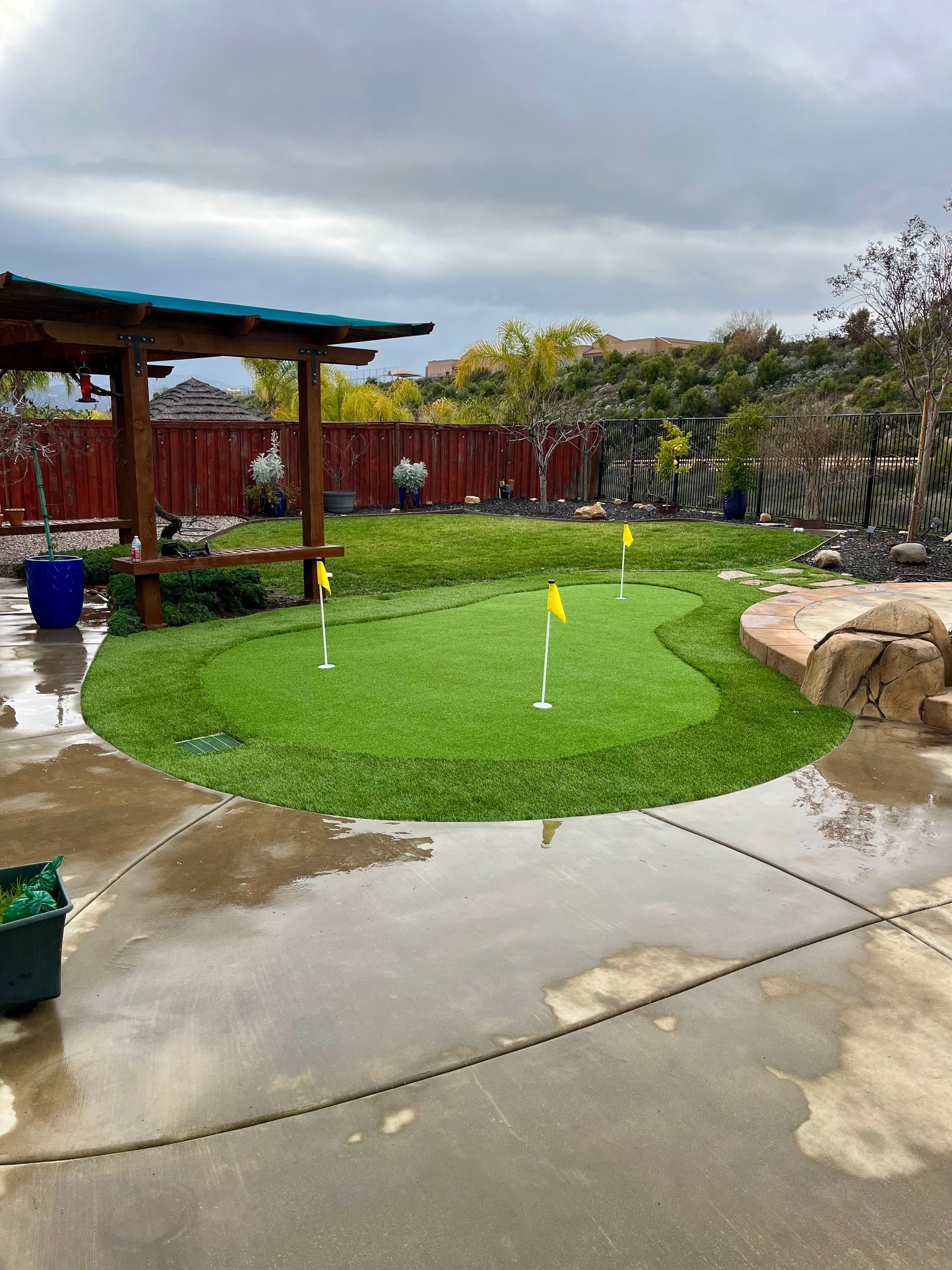 Old Mulch Clean Up & Artificial Turf Installation for Golf Putting Green Design in Temecula, CA