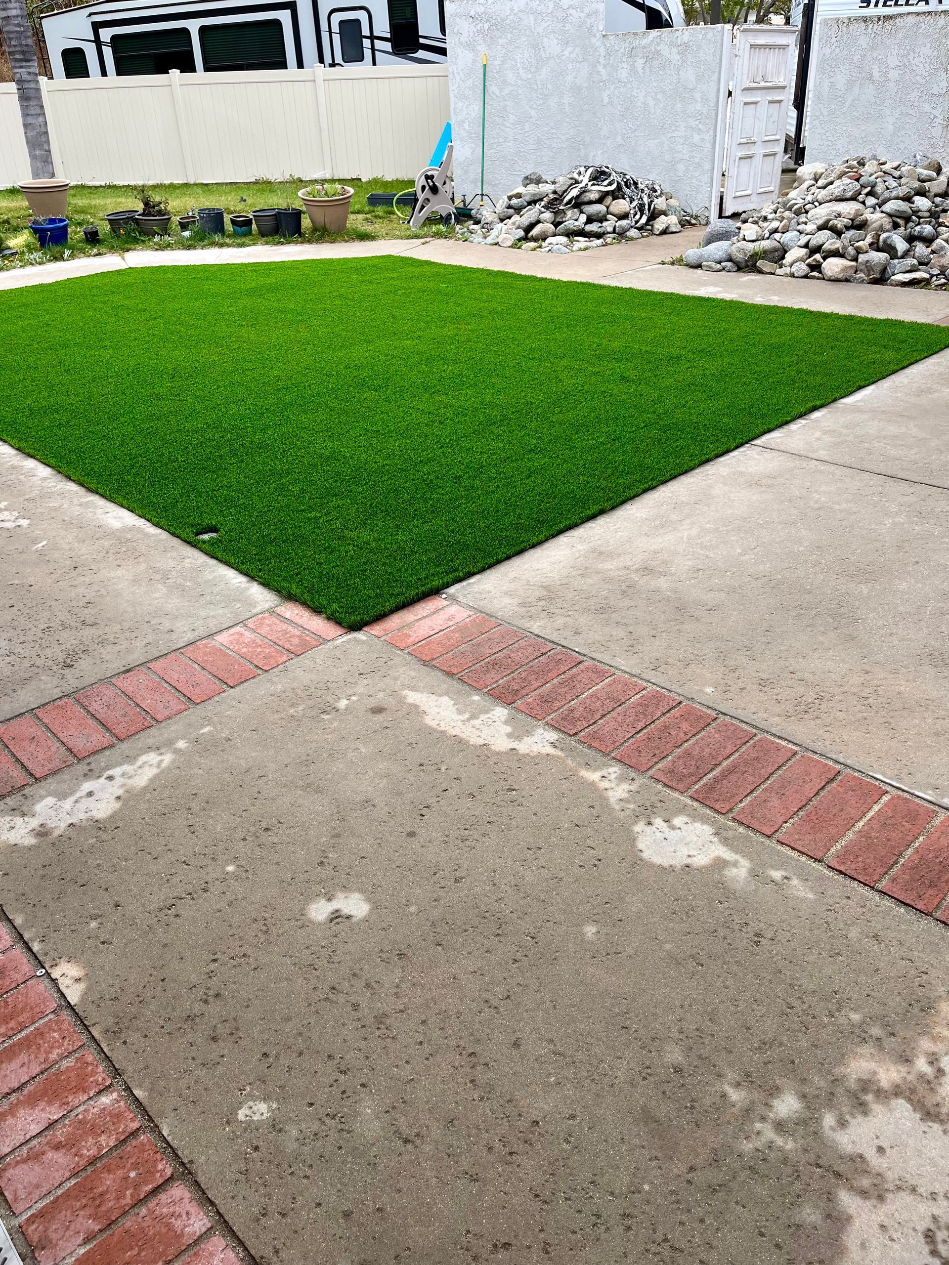 artificial grass green in backyard area