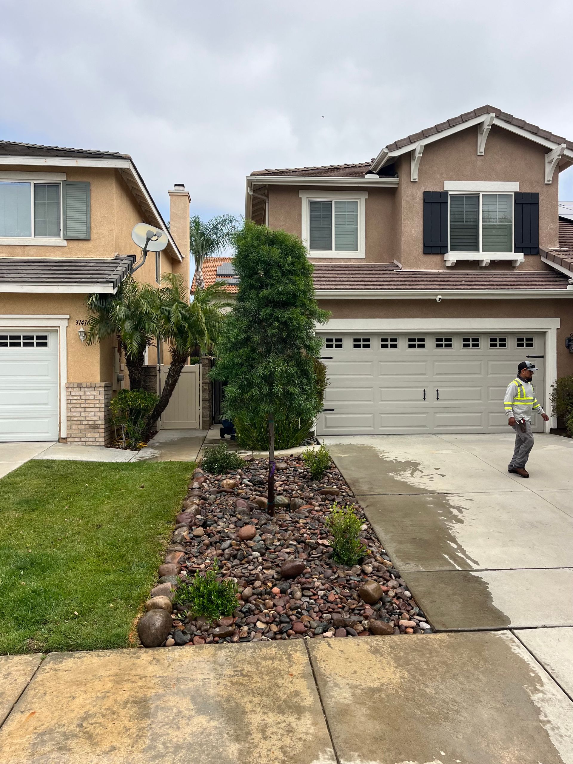Driveway-Threatening Tree & Old Lawn Removed for River Rock Landscaping in Murrieta, CA