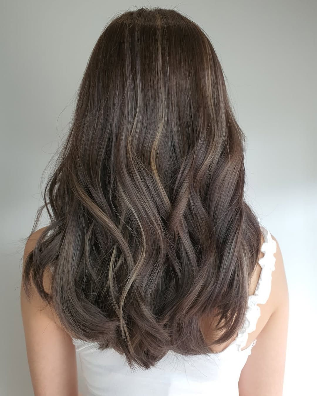 A photo of an Ash Brown hair color