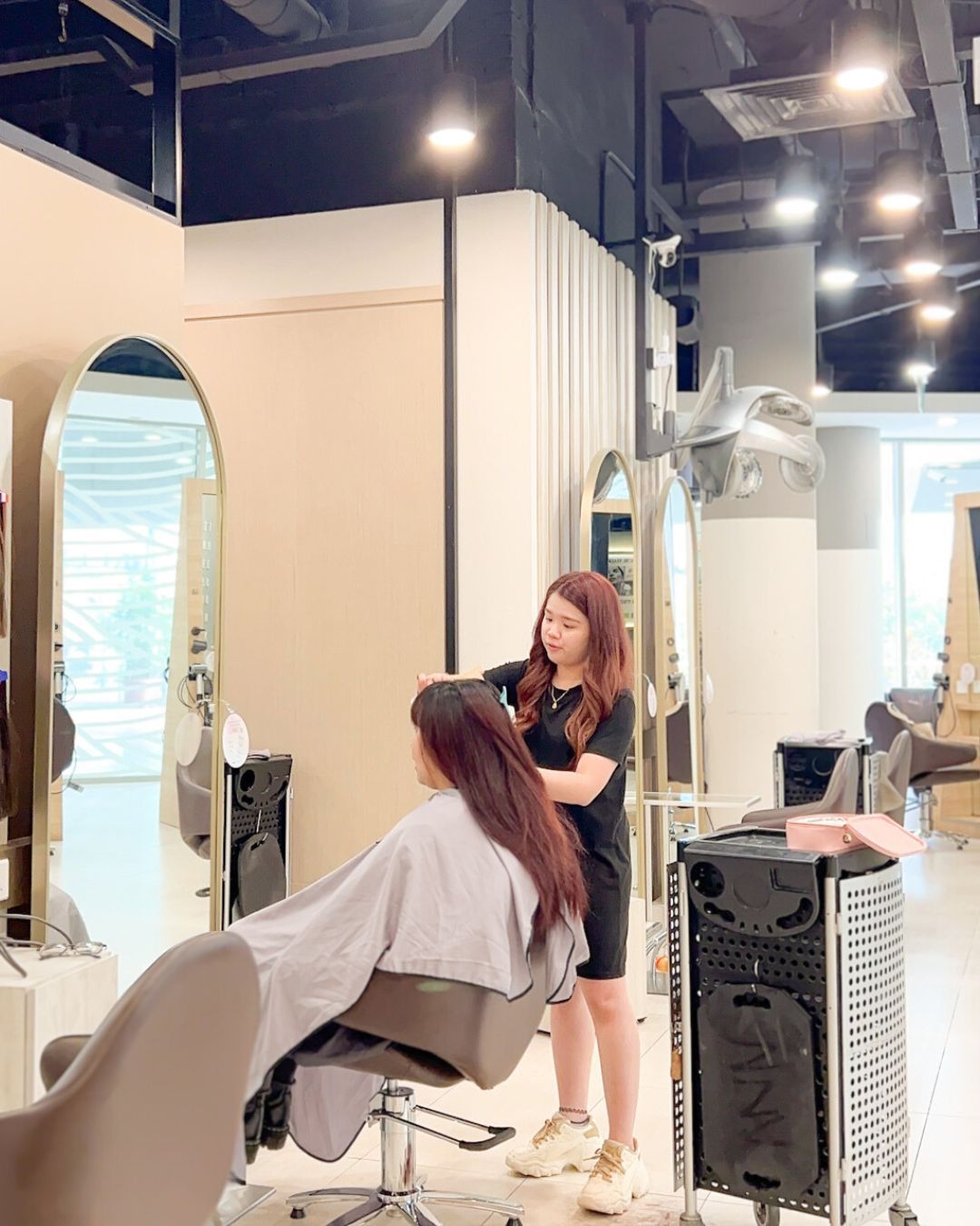 A photo of our hairdresser at our hair salon in Singapore