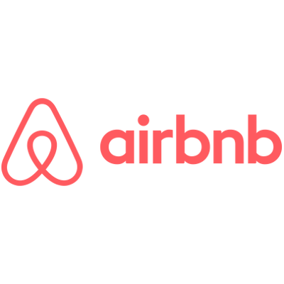 Logotipo de Airbnb en color rosa coral sobre fondo blanco.