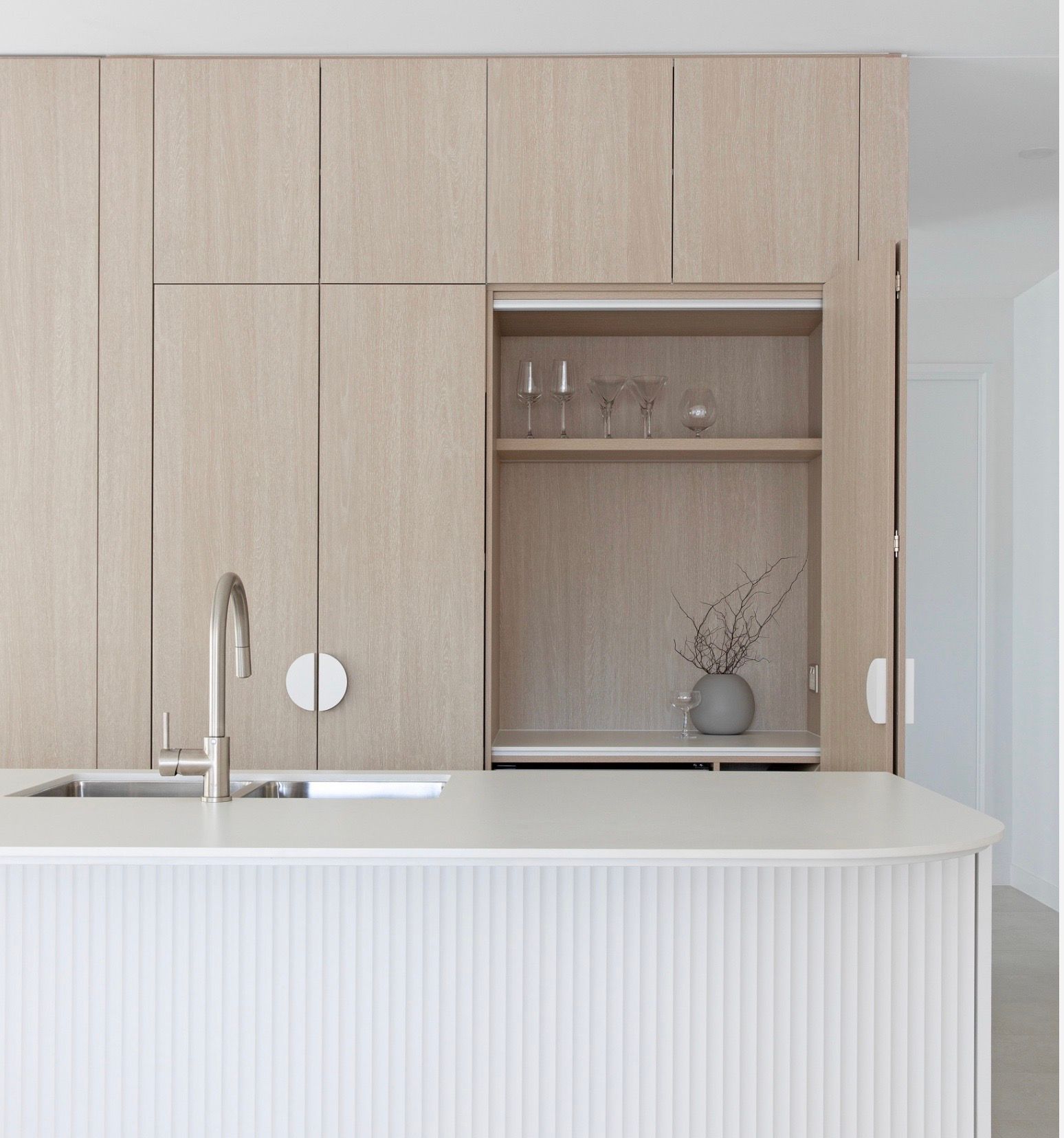 Kitchen Cabinet with Pull-Out Shelves Holding Cookware — Lukas Joinery in Belmont, NSW