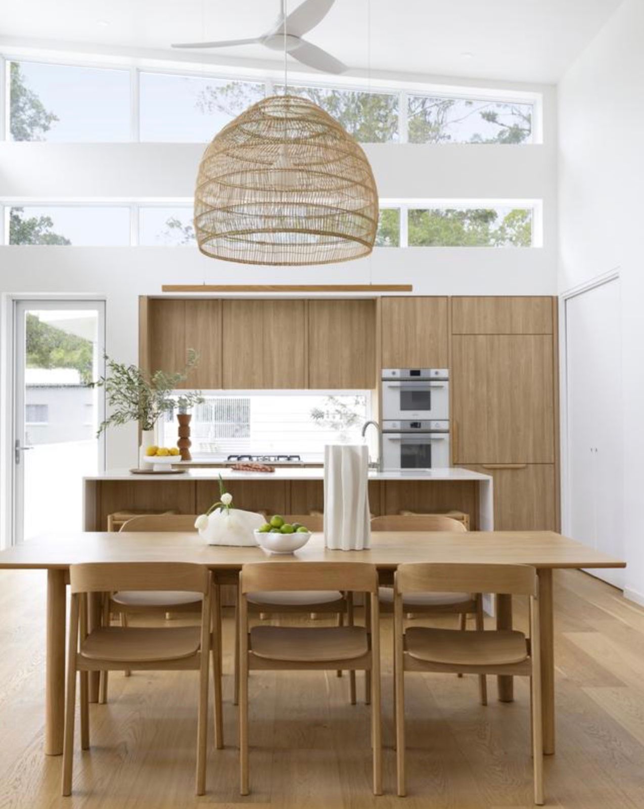 Dining Room with Wooden Table and Chairs — Lukas Joinery in Lake Macquarie, NSW