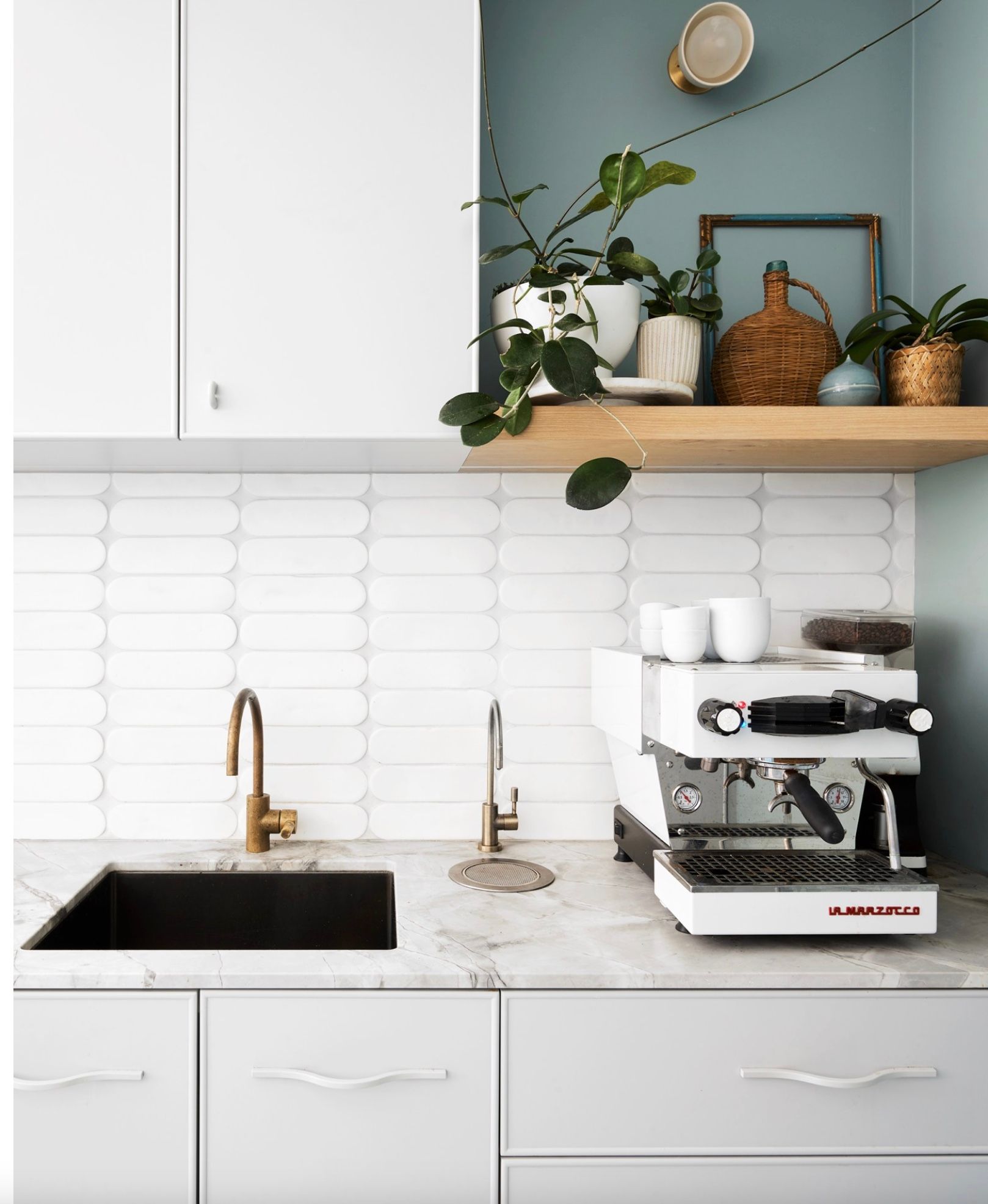 A White Kitchen with A Coffee Machine — Lukas Joinery in Belmont, NSW