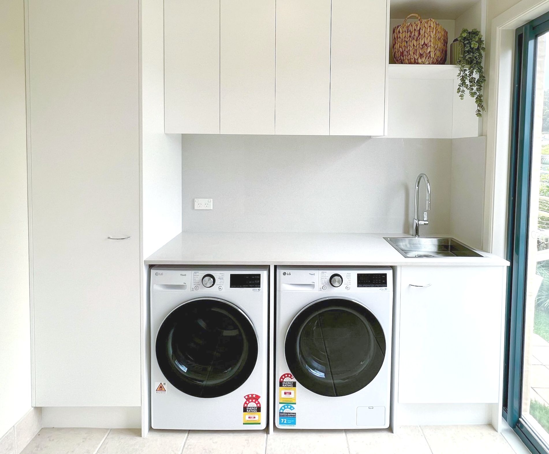 Modern Accessible Kitchen Display with White Cabinets — Lukas Joinery in Belmont, NSW