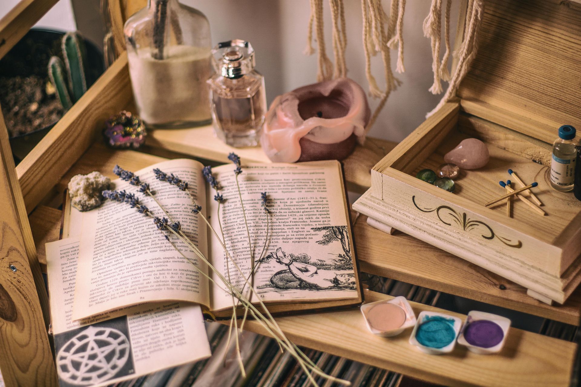 “Sound bath and chakra healing tools including singing bowls, crystals, and gentle candlelight.”