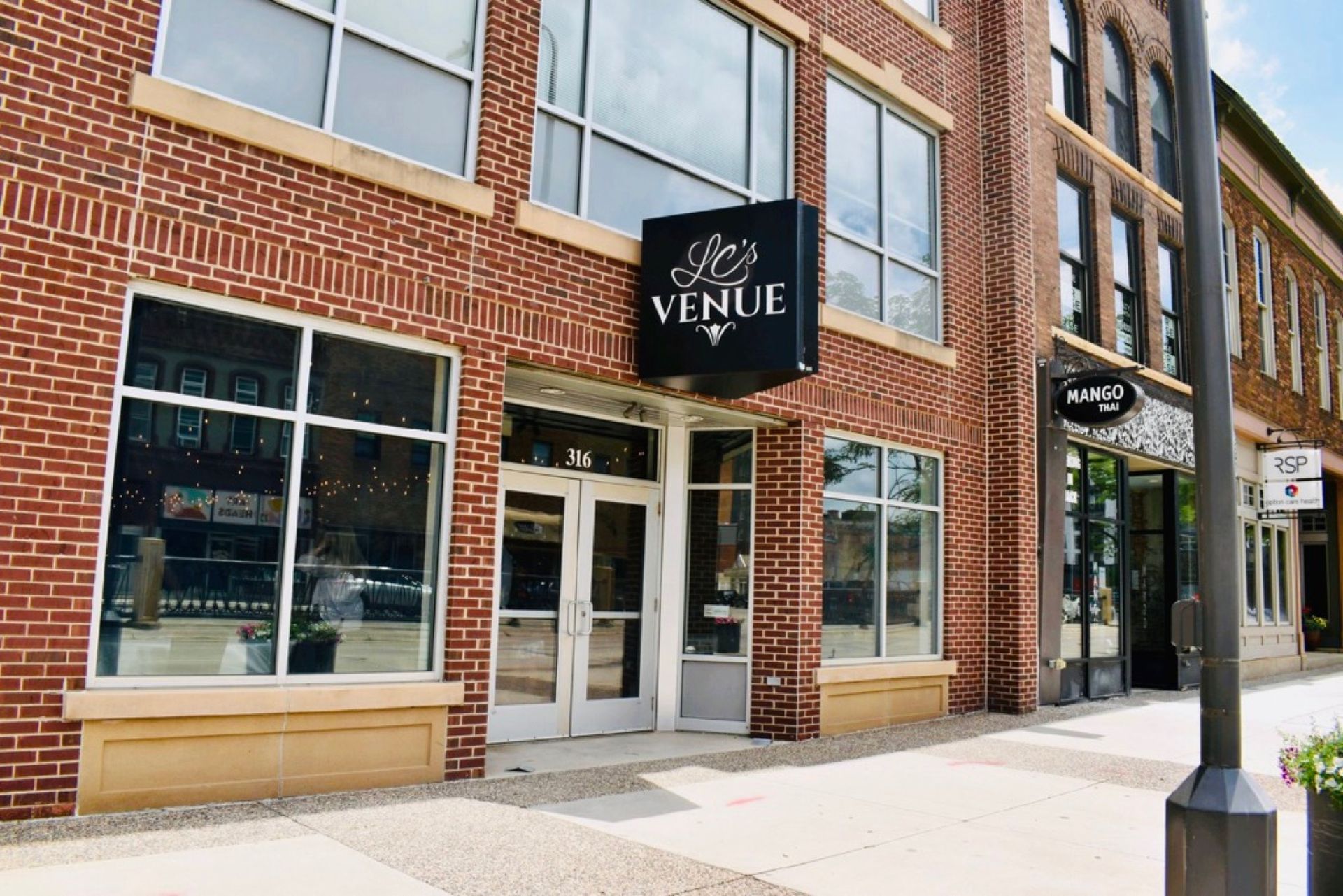 Building storefront with a sign that says 