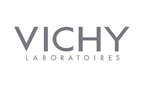 Das Logo von Vichy Laboratoires ist ein grau-weißes Logo auf weißem Hintergrund.