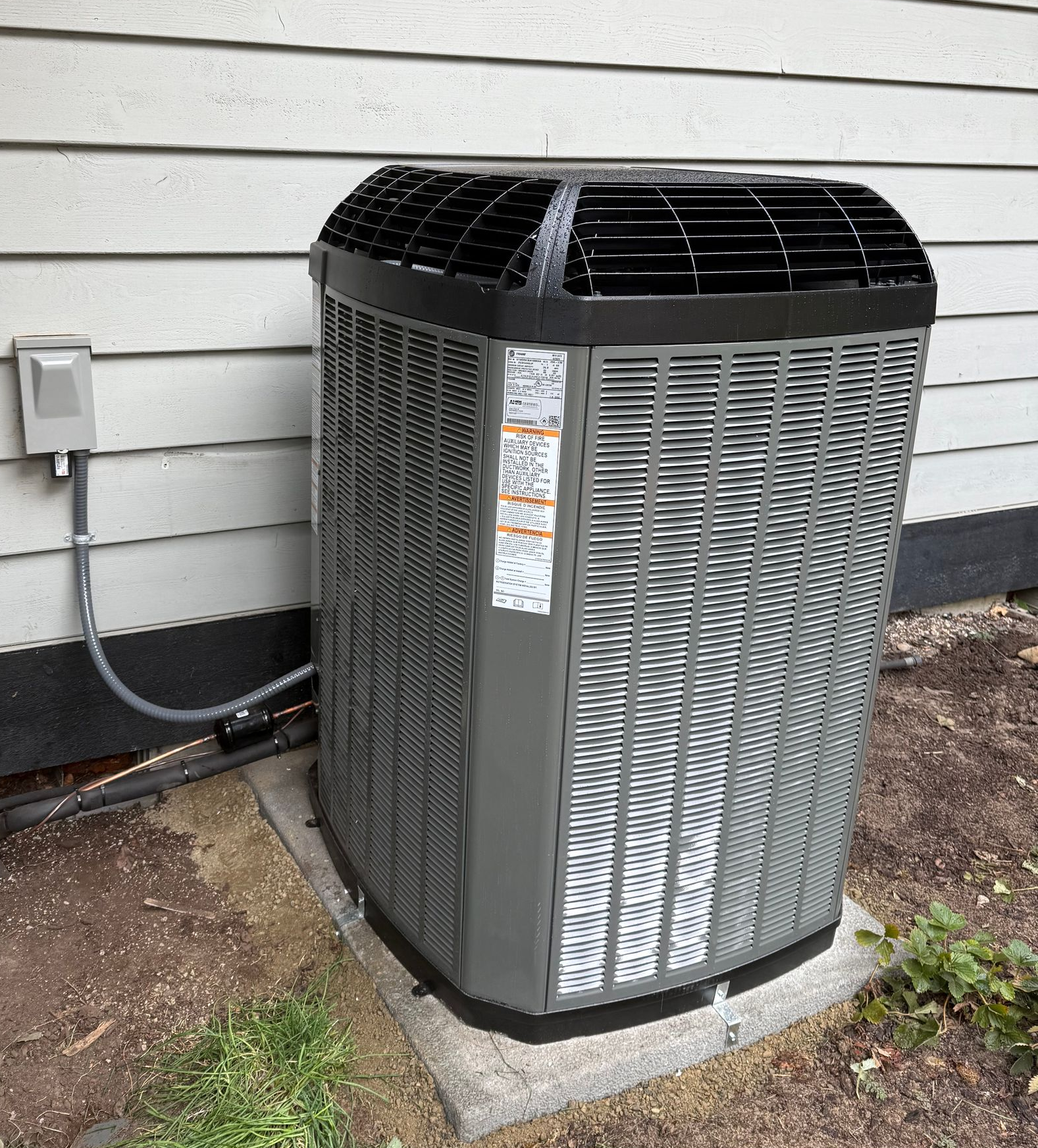 Air conditioning units installed outside a home in Bremerton, WA