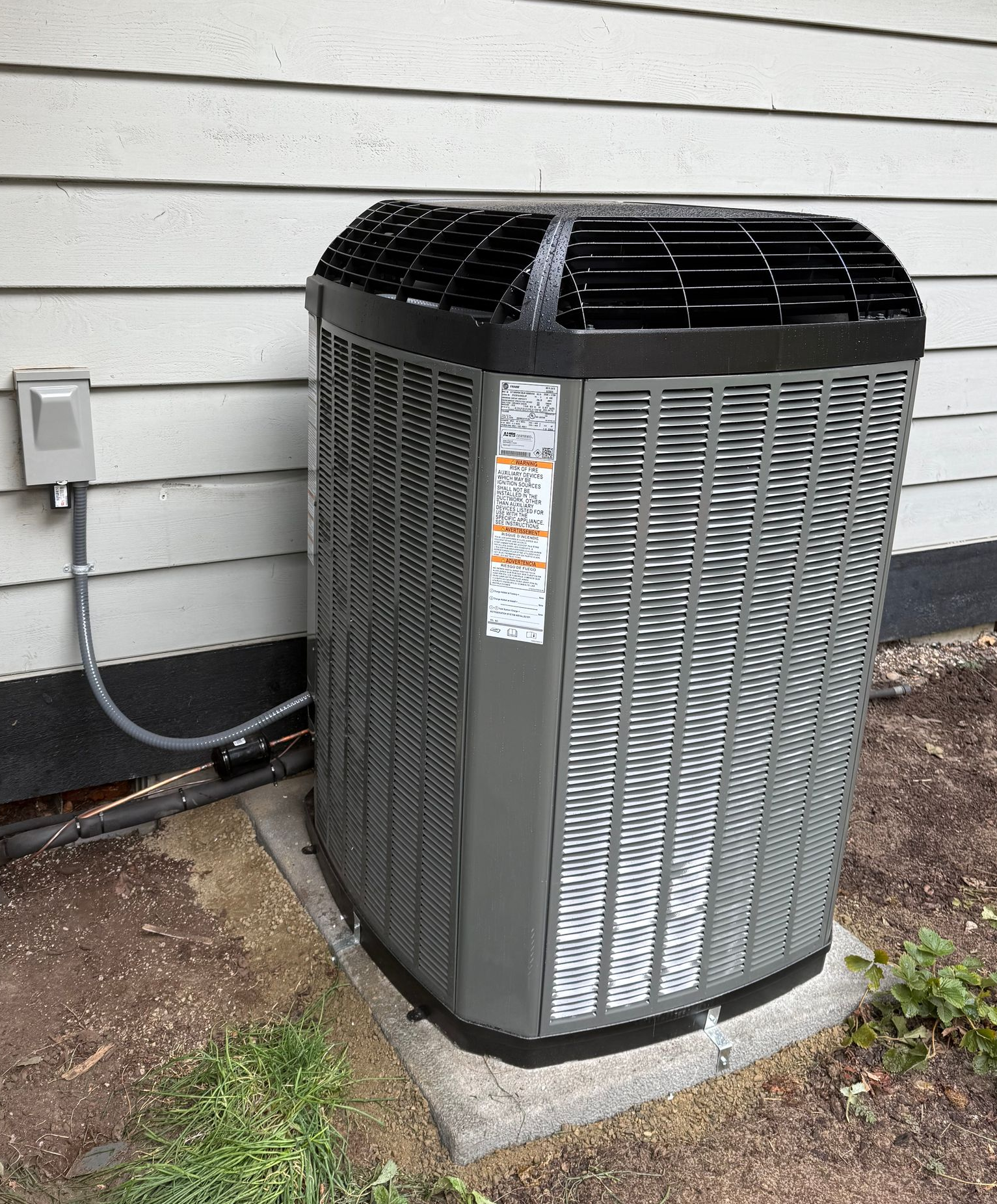 Air conditioning units installed outside a home in Bremerton, WA