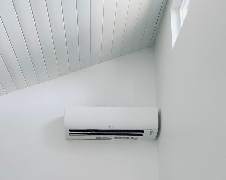 Central air conditioning unit installed outside home in Belfair WA