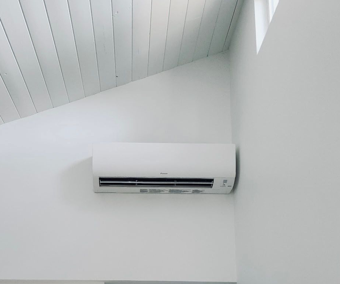 Central air conditioning unit installed outside home in Belfair WA