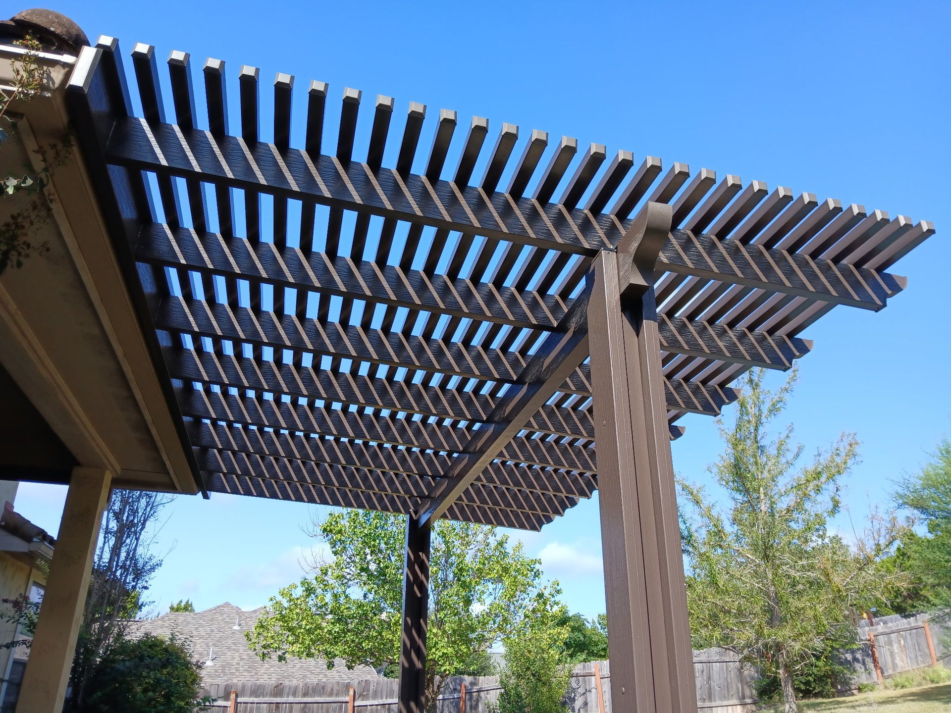 Brown Aluminum Pergola built by Colorado Outdoor Builders