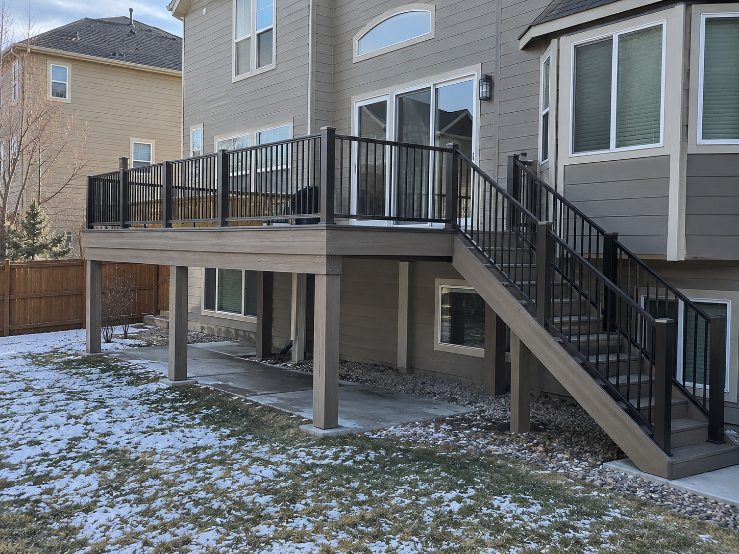 Composite Deck with Black Railing built by Colorado Outdoor Builders