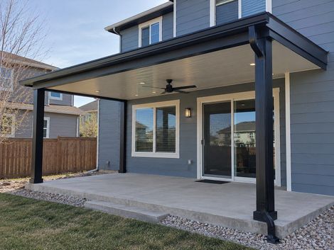 Insulated aluminum patio cover over a Denver backyard patio