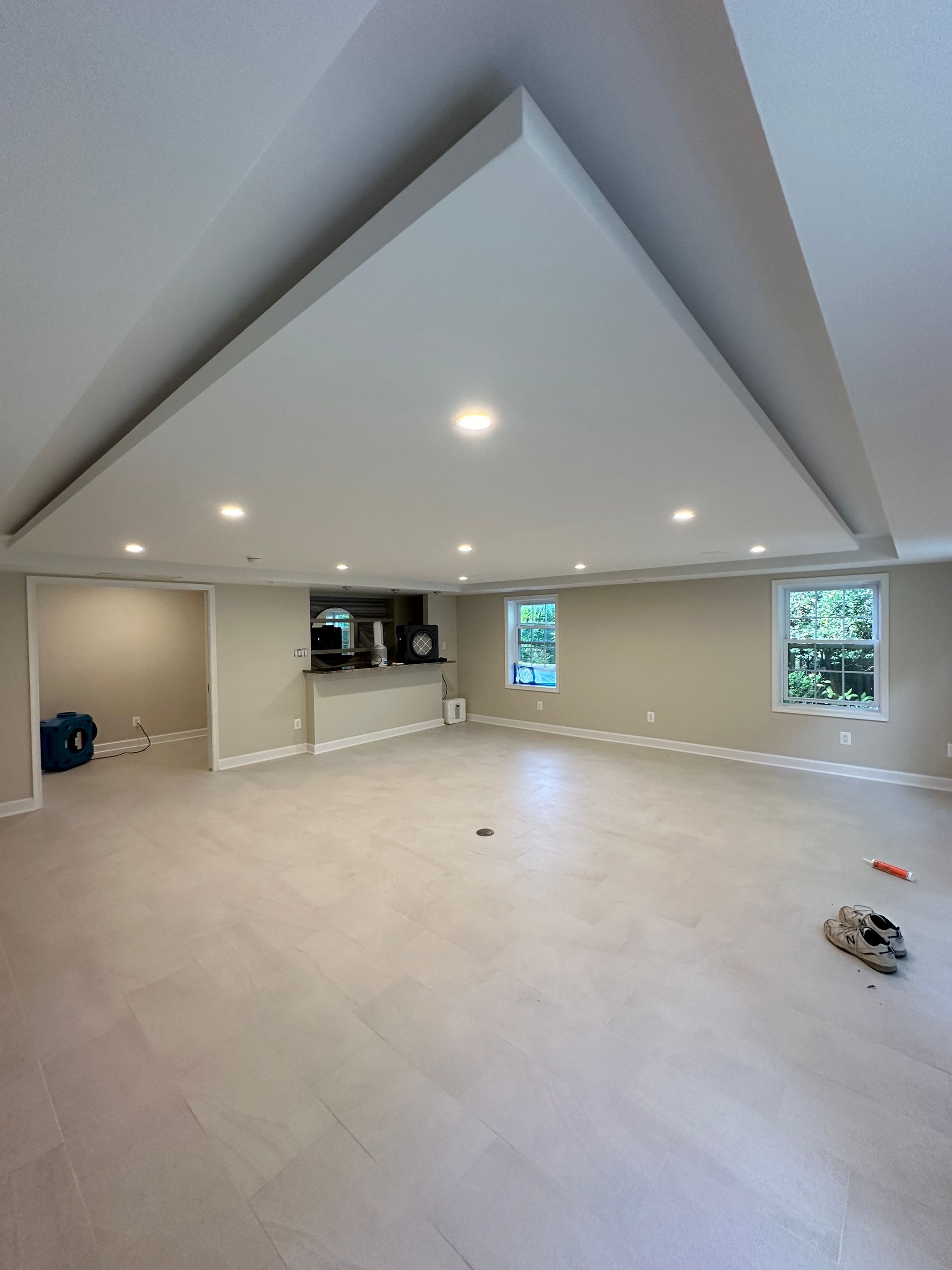A large empty room with a ceiling that is very high
