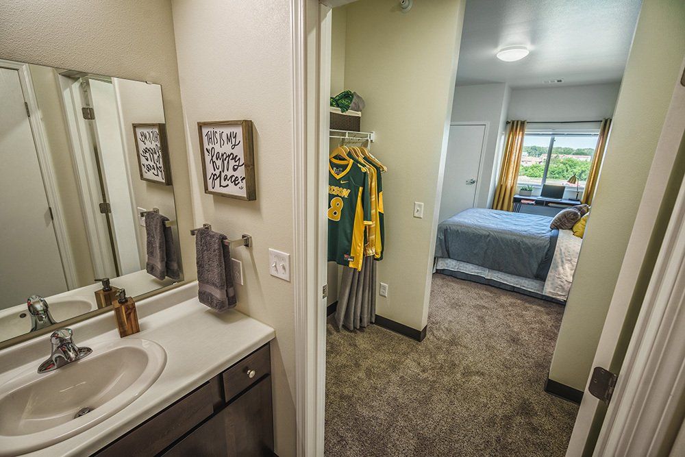 U32 Apartments in Fargo ND Bedroom and Bathroom