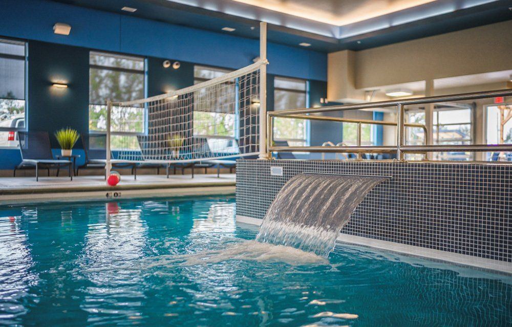 U32 Apartments in Fargo ND Pool with Volleyball Net