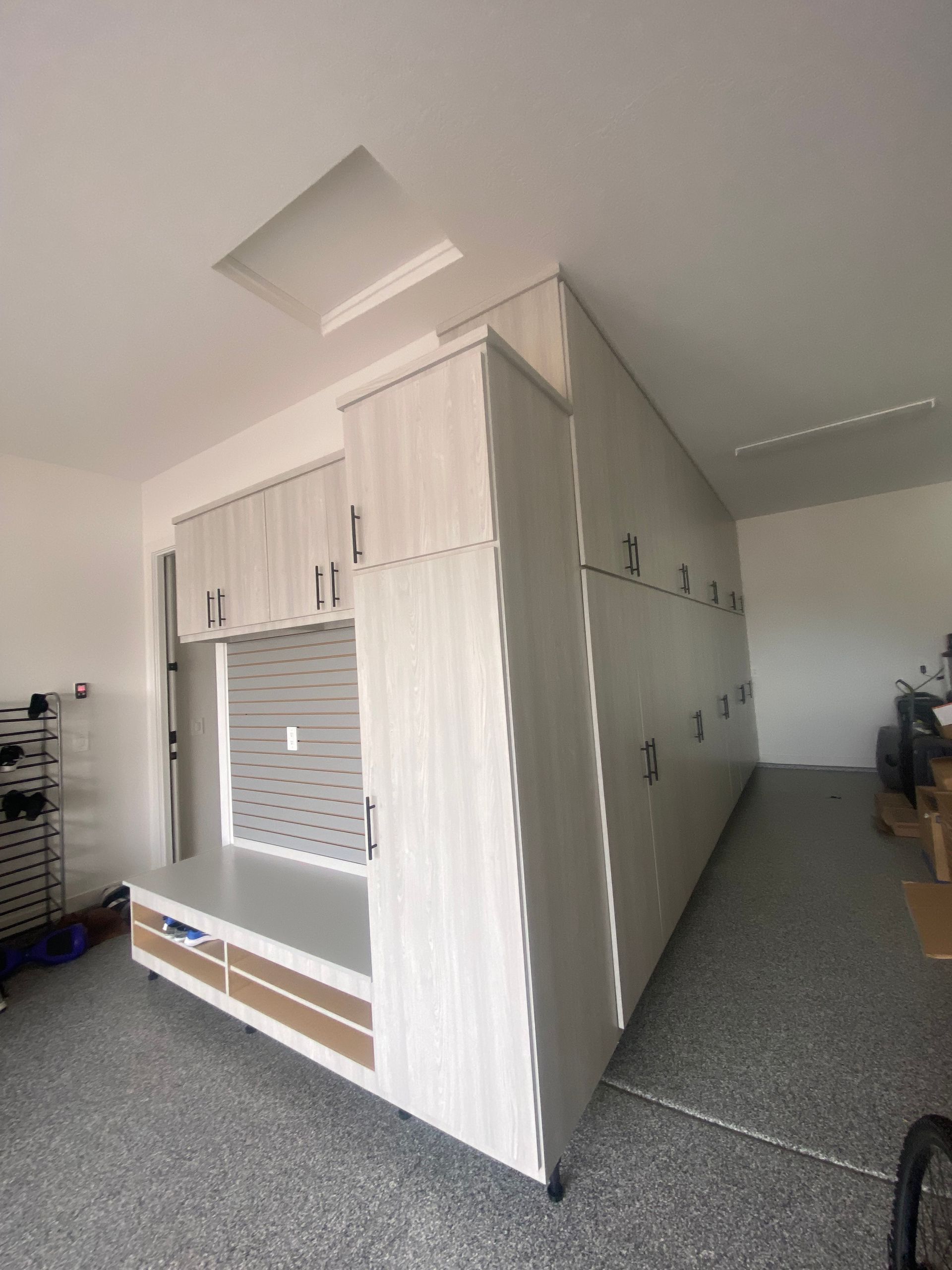 A garage with a lot of cabinets